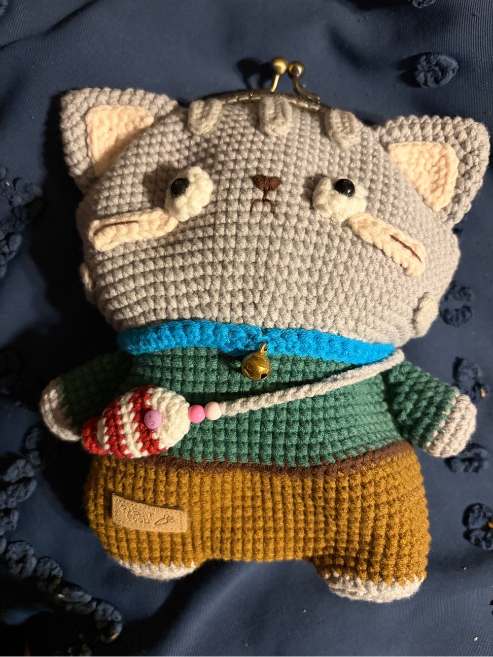 Handcrafted amigurumi cat bag. Very cute to use as a clutch. New, never used.